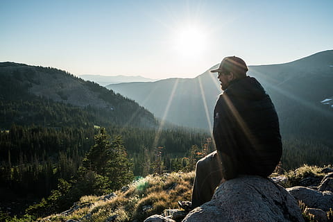 man, boy, guy, sunrise, mountains, trees, forest, hat, smile HD wallpaper