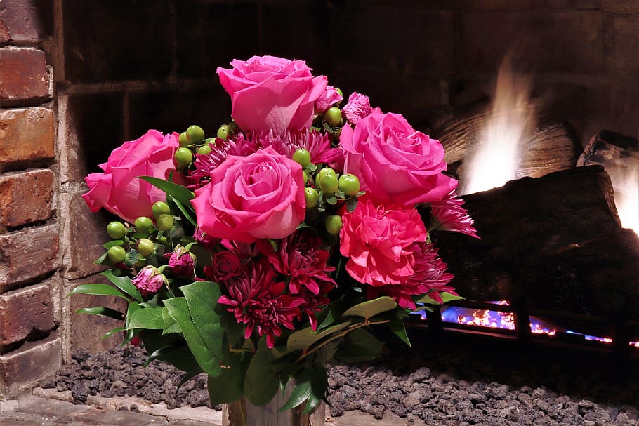 roses, fireplace, red, green, blooms, bricks, mood, romantic HD wallpaper