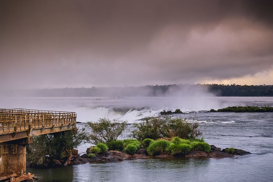 Water Falls Near Bridge Under White Cloudy Sky, clouds, daylight HD wallpaper