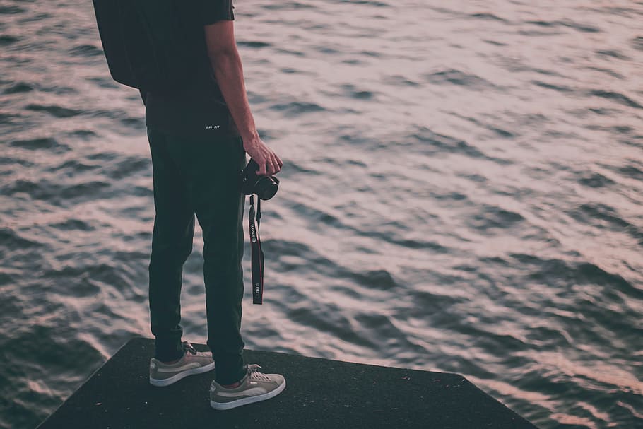 man standing near body of water, clothing, apparel, shoe, footwear, HD wallpaper