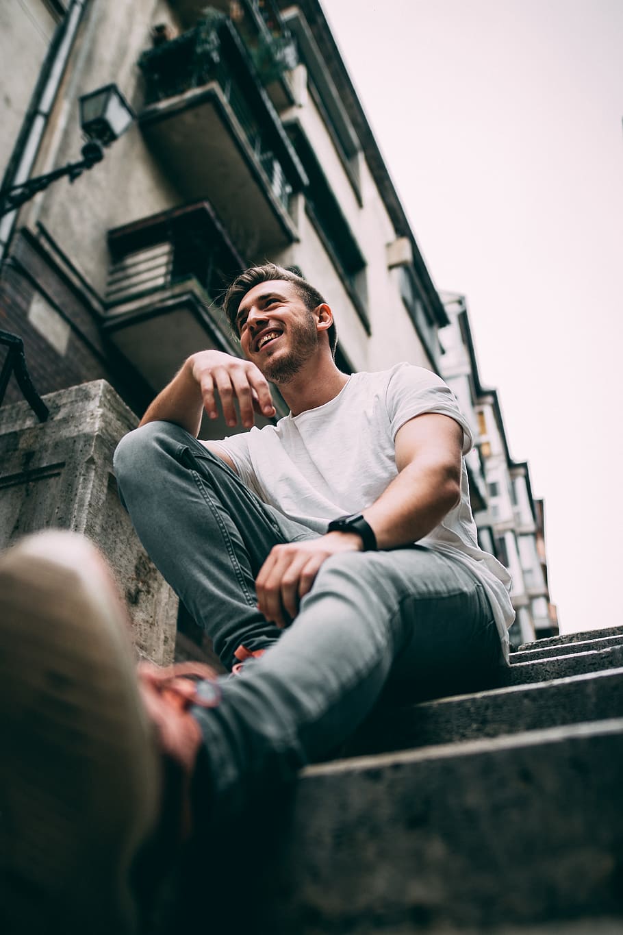 man sitting on stairs, architecture, men, low angle view, casual clothing HD wallpaper