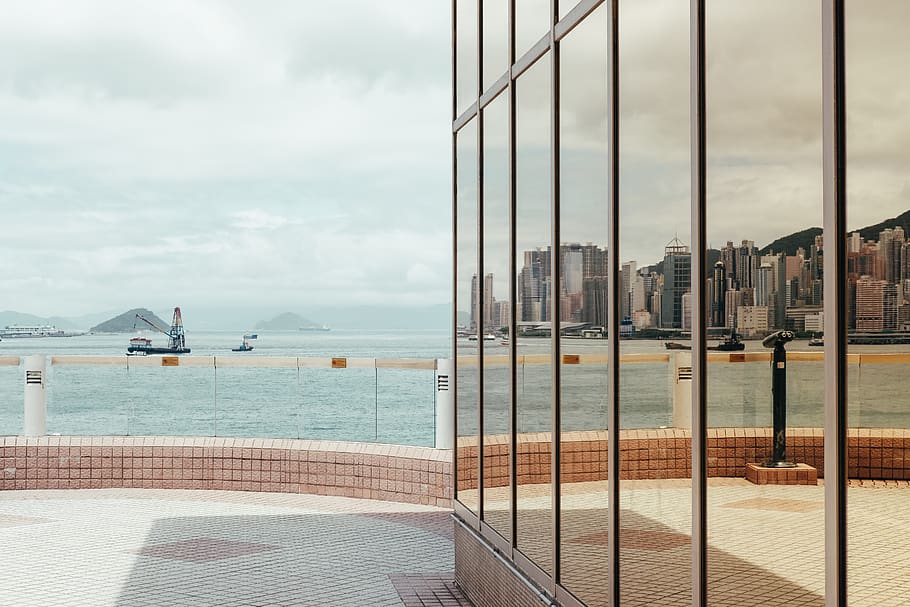 building with mirror panels, hong kong, water, victoria harbour HD wallpaper