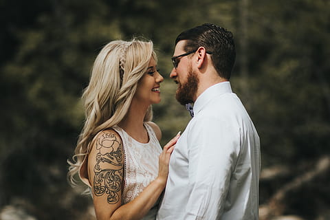 Matching sun, wave and moon tattoos for couple.