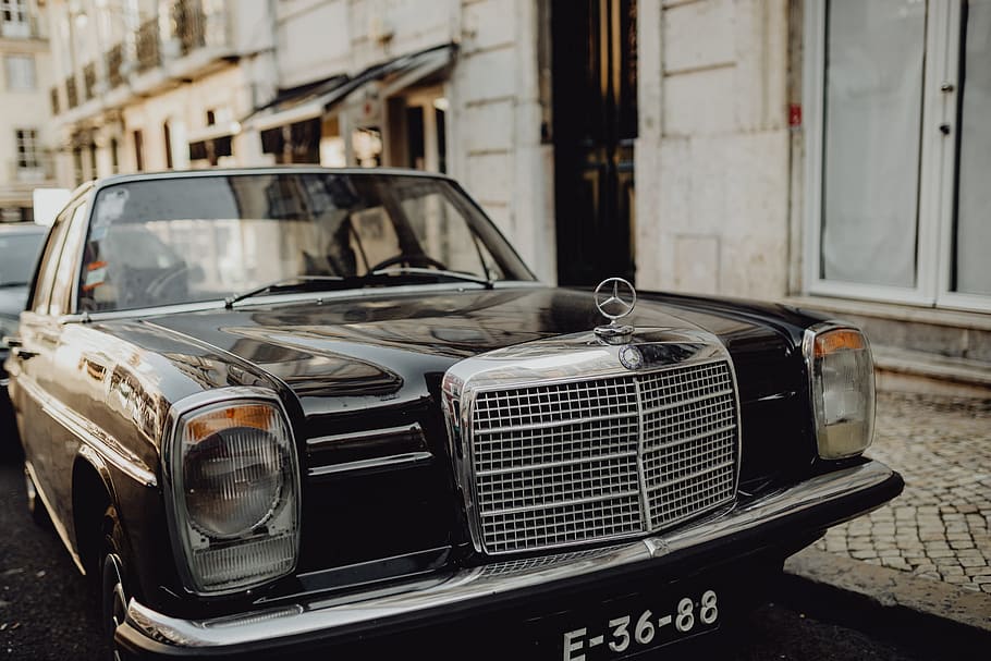 An old Mercedes Benz parked in the street, Lisbon, Portugal, vintage