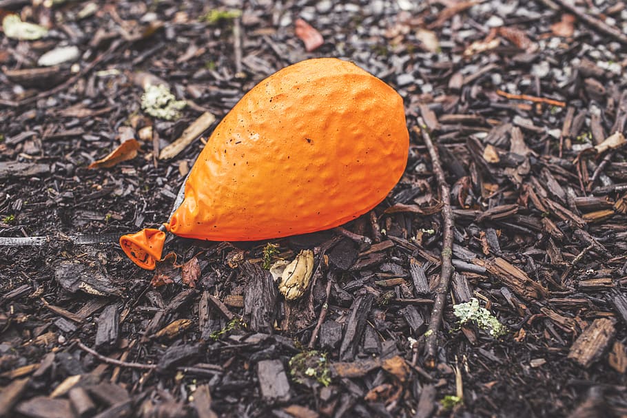 orange, balloon, deflated, ground, sticks, orange color, land HD wallpaper