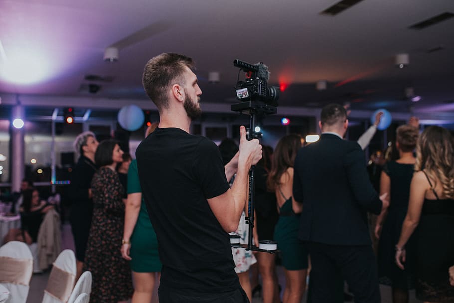 man holding camera, person, human, tripod, indoors, interior design HD wallpaper