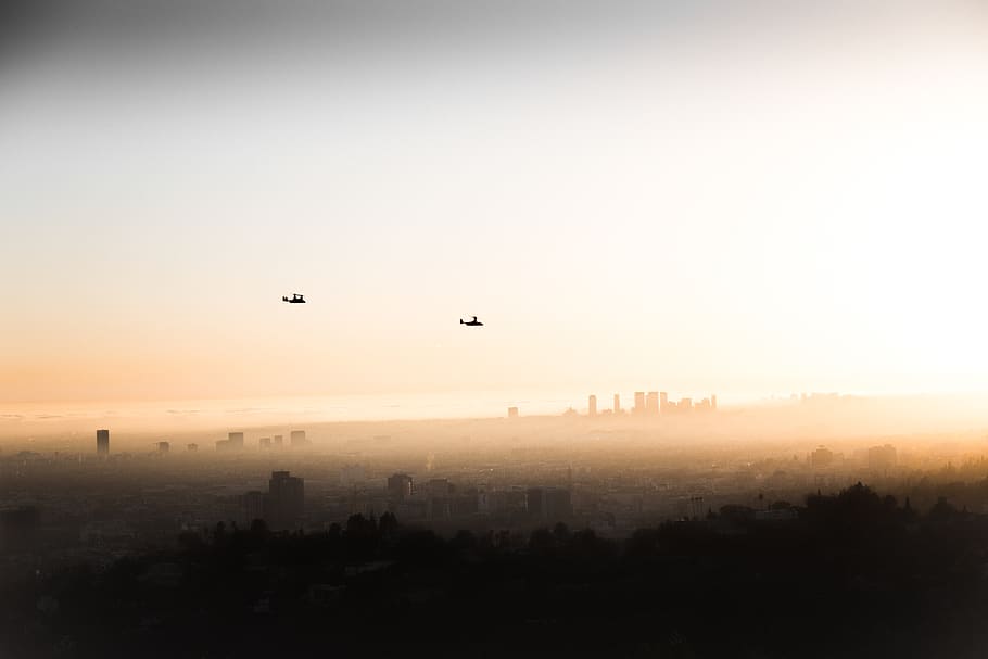 two helicopters flying over the city, nature, los angeles, fog, HD wallpaper