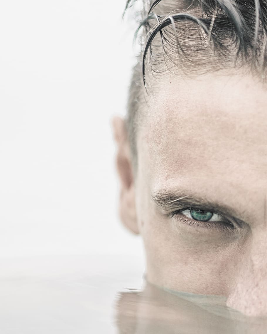 man's half face in water, human body part, portrait, adult, one person HD wallpaper
