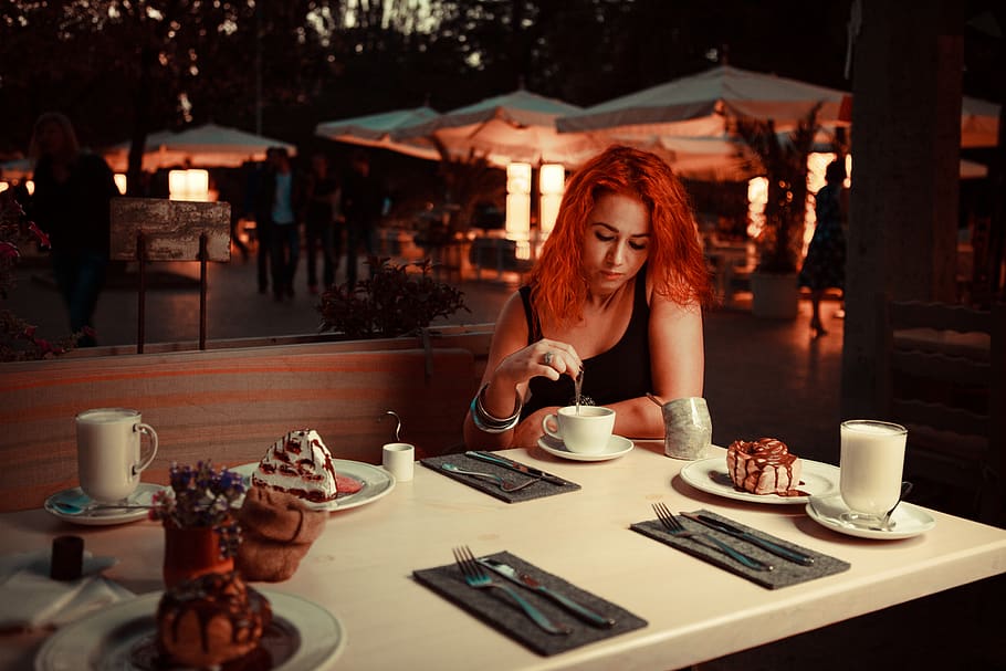 woman sitting on teacup on sauce, human, person, restaurant, food