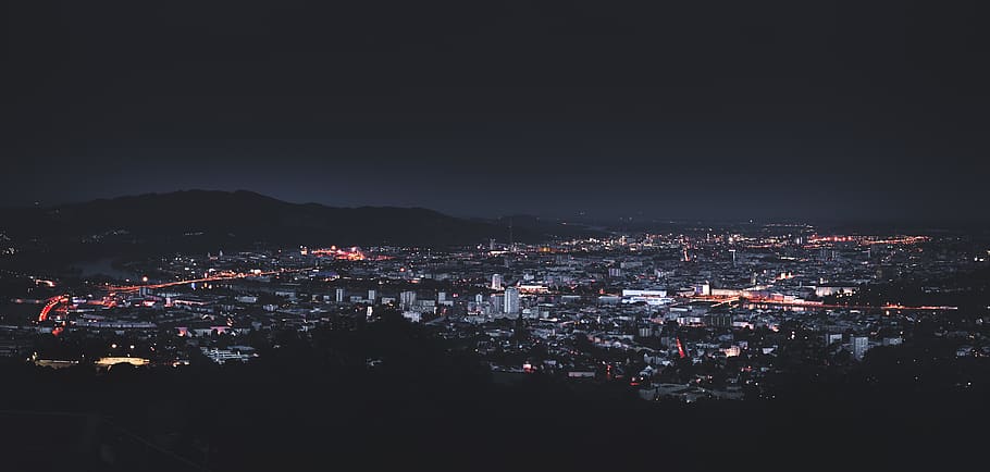 city skyline photography during nighttime, linz, austria, urban