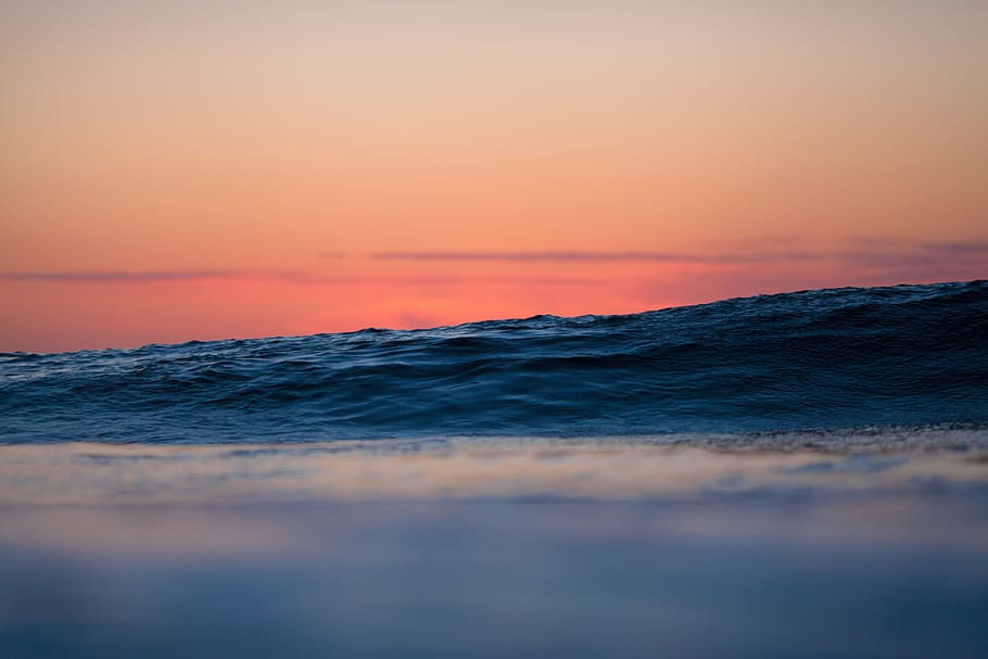 Ocean is surreal, sea, wave, sunset, pink, golden hour, water HD wallpaper