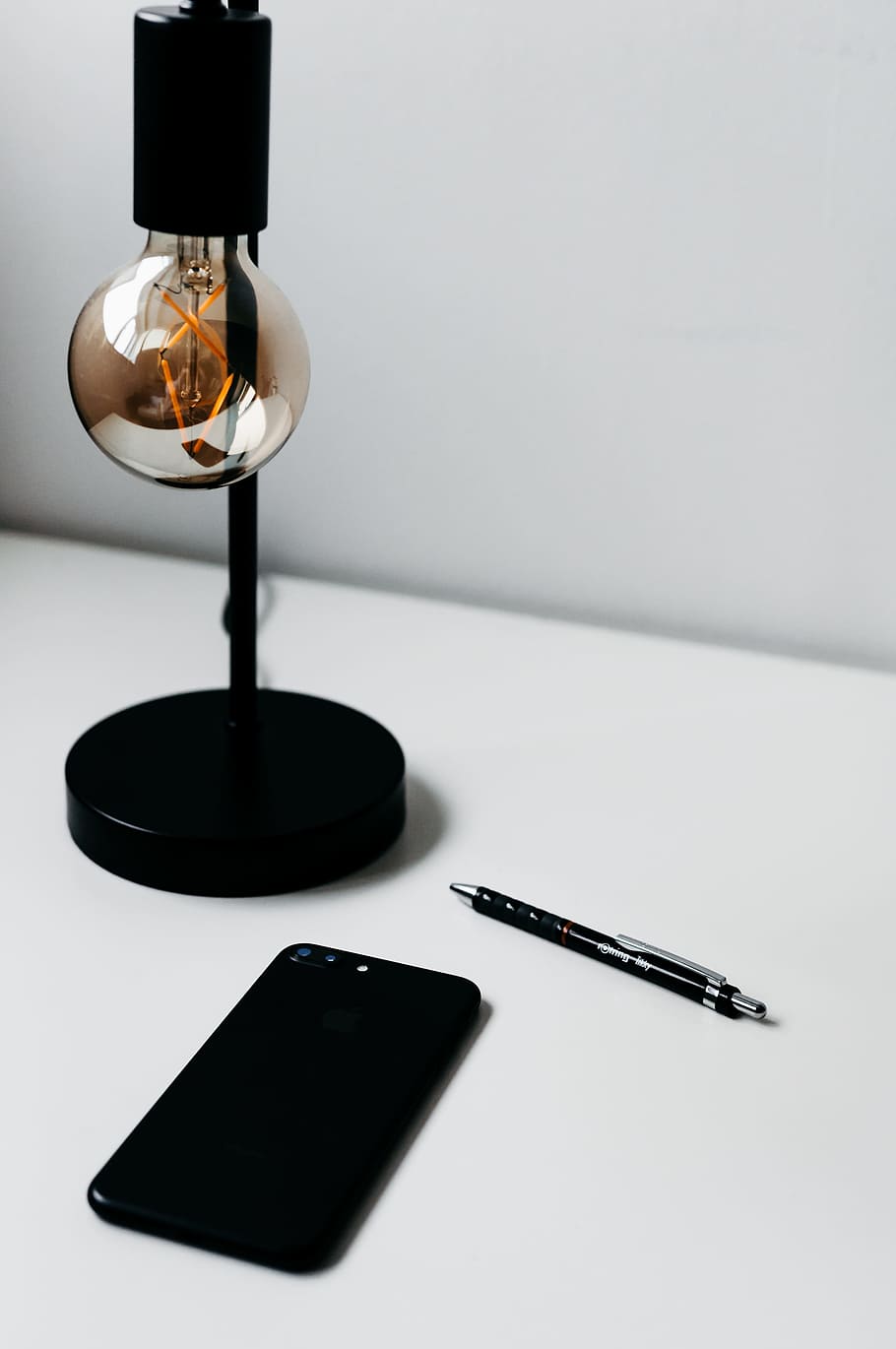 All Black, desk, edison bulb, iphone, lamp, pen, smartphone, office