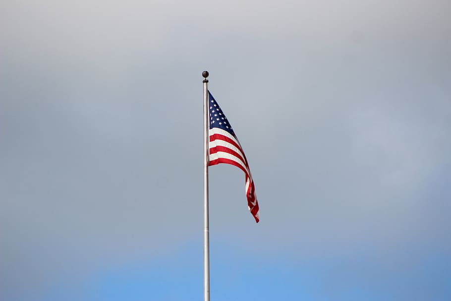 waving US flag under grey cloudy sky, pole, emblem, united states HD wallpaper