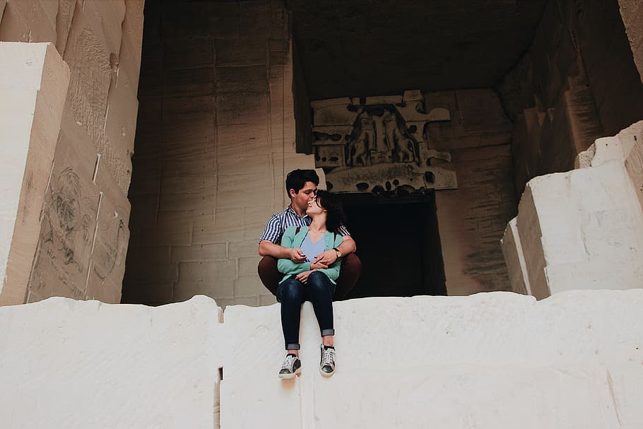 couple sitting inside structure, full length, one person, real people HD wallpaper