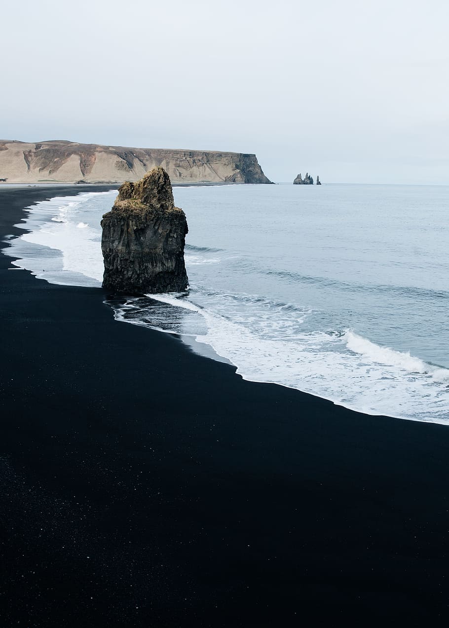 brown monolith rock on seashore, coast, beach, wave, ocean, iceland, HD wallpaper