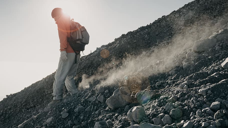 man walking on rock mountain, men, one person, standing, beauty in nature HD wallpaper
