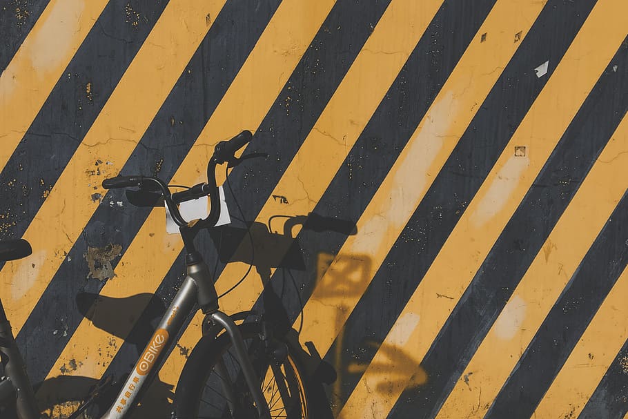 Bicycle Parked By The Wall, shadow, transportation, yellow, high angle view HD wallpaper