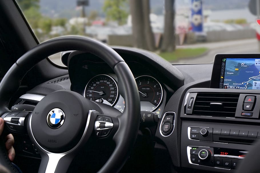 Person Driving Bmw Car, interior, map, navigation, route, speedo HD wallpaper