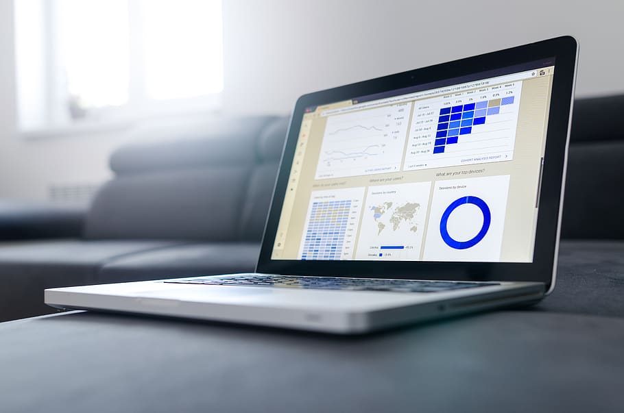 Black and Gray Laptop on Black Sectional Couch, data, graphs HD wallpaper