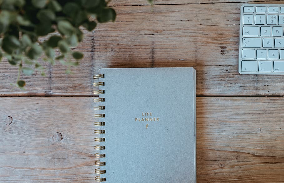 gray notebook on wood, wood - material, table, no people, publication HD wallpaper