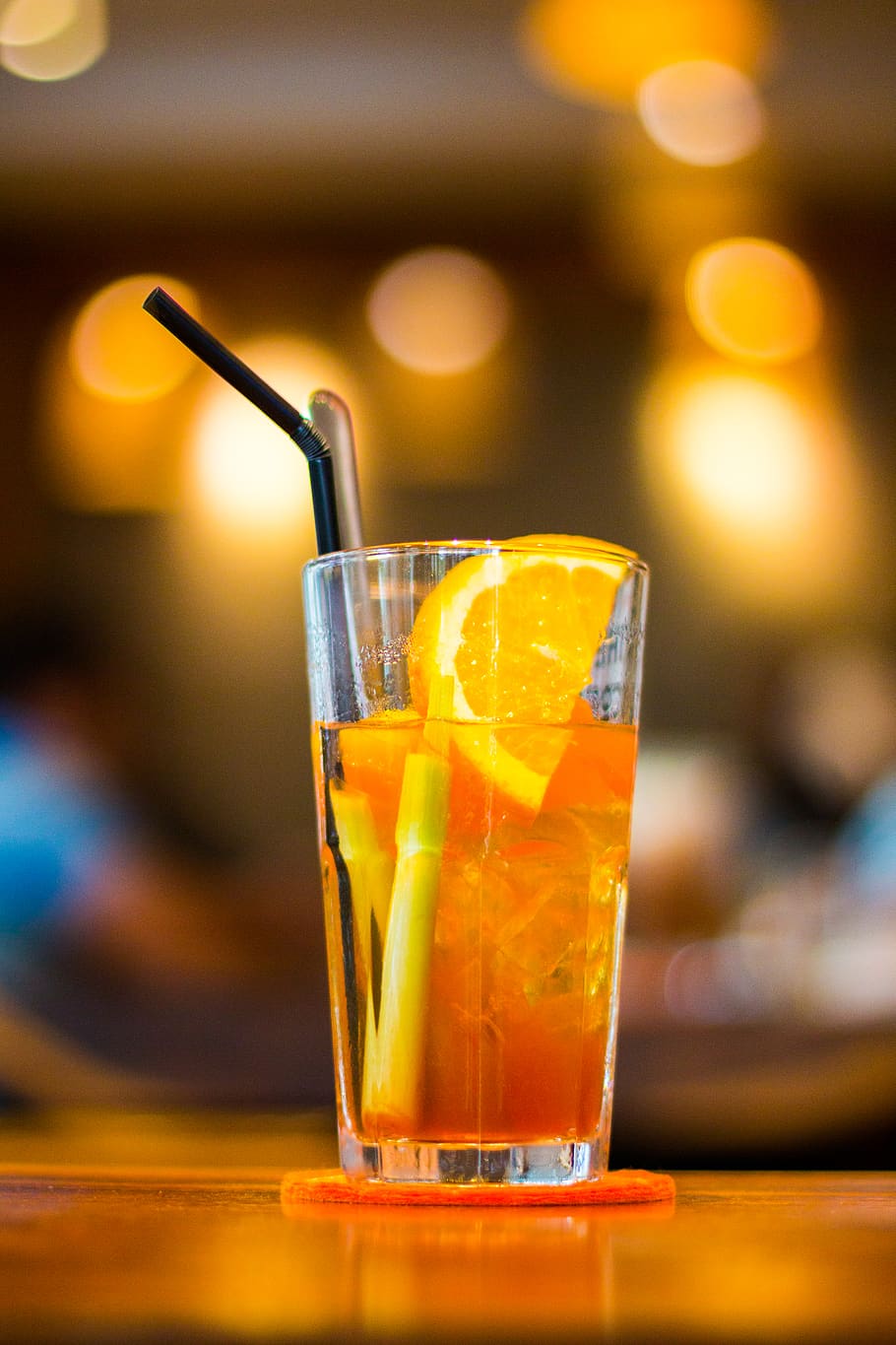Clear Drinking Glass Filled With Orange Juice With Black Straw HD wallpaper