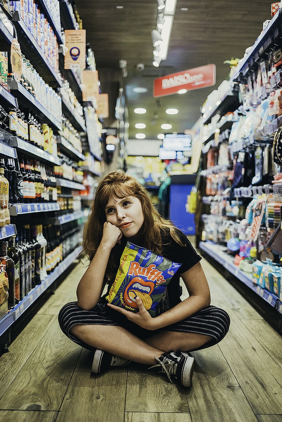 Woman Sitting on Floor Holding a Chip Pack, adult, assorted, attractive, HD wallpaper