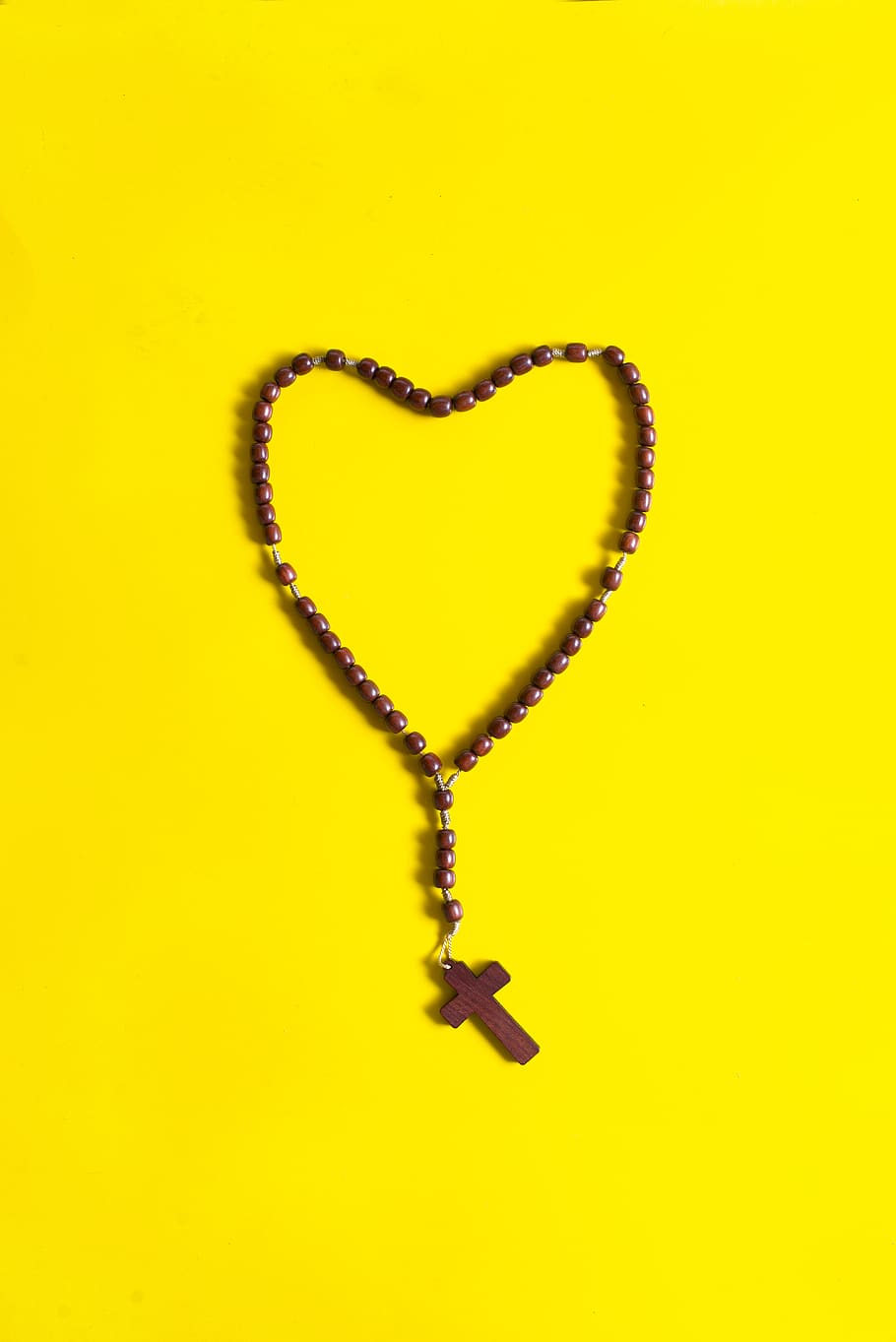 Brown Rosary on Yellow Surface, art, color, design, disjunct, HD wallpaper