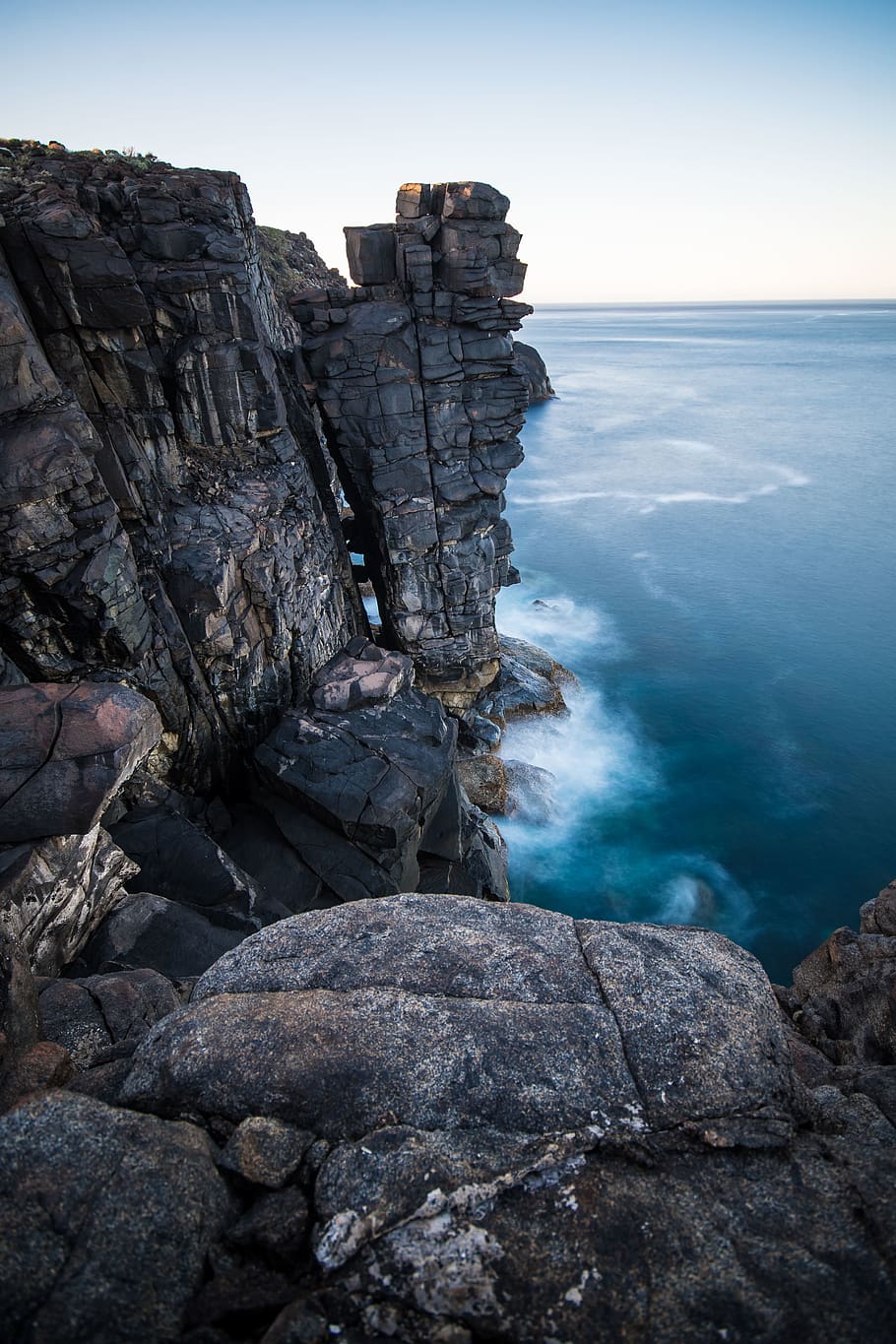 cliffs across sea, outdoors, nature, promontory, water, ocean HD wallpaper