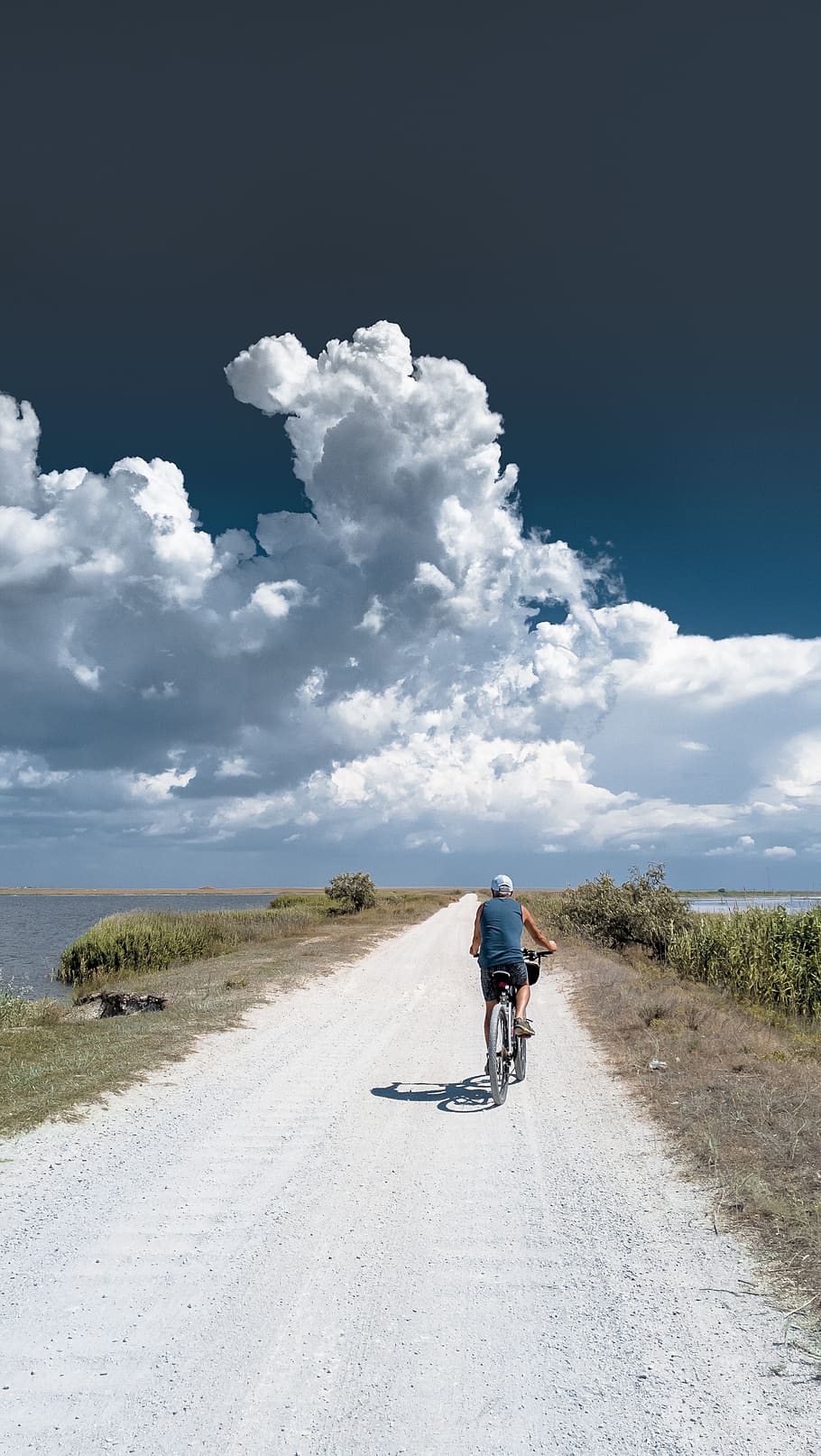 road, clouds, horizon, dam, bike, cyclist, blue, marshrut, sky HD wallpaper