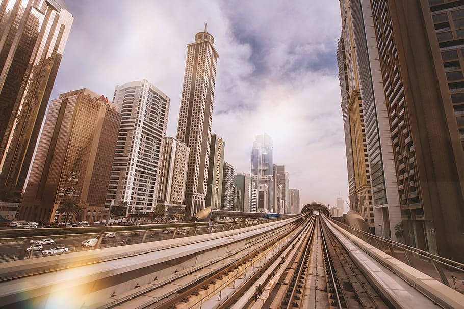 Beautiful view from the metro at skyscrapers in the downtown of Dubai HD wallpaper