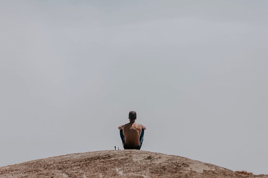 Man Sitting on Ground, action, adult, back view, daylight, dusk