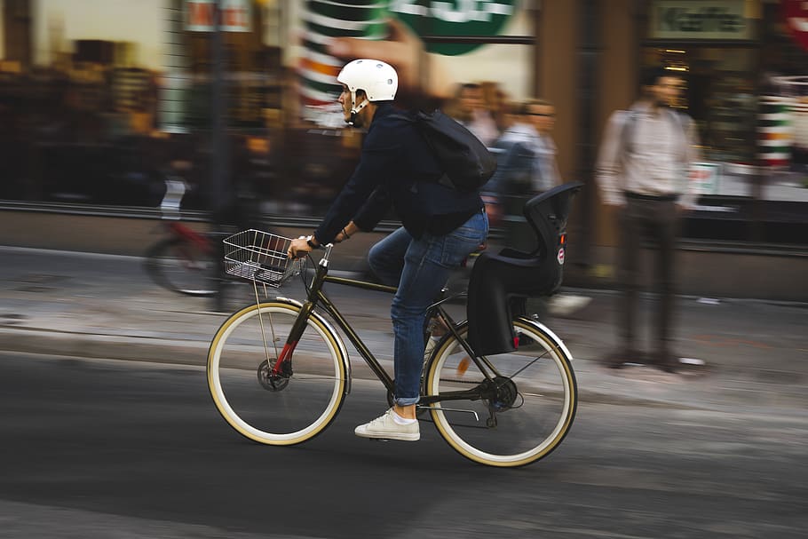 man riding bike, bicycle, transportation, city, motion, real people HD wallpaper