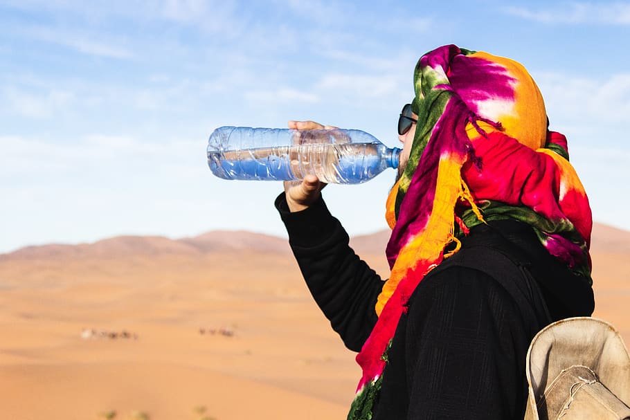 person drinking water, soil, nature, outdoors, human, sand, desert HD wallpaper
