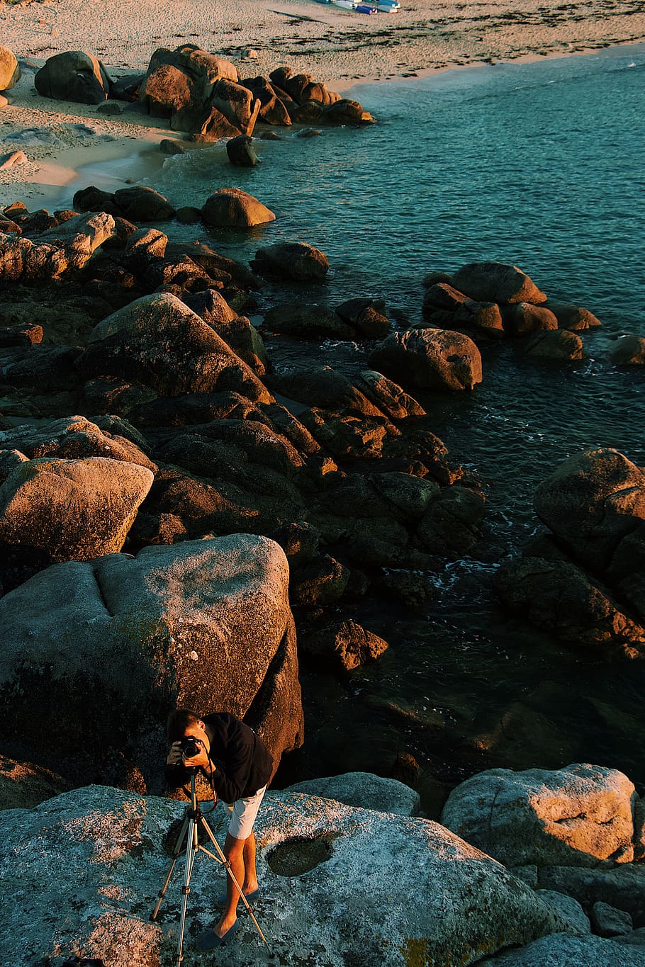 man standing on rock, sea, promontory, rubble, shoreline, water HD wallpaper