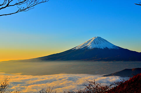 Black and White Mountain over Yellow White and Blue Sky, clouds HD wallpaper