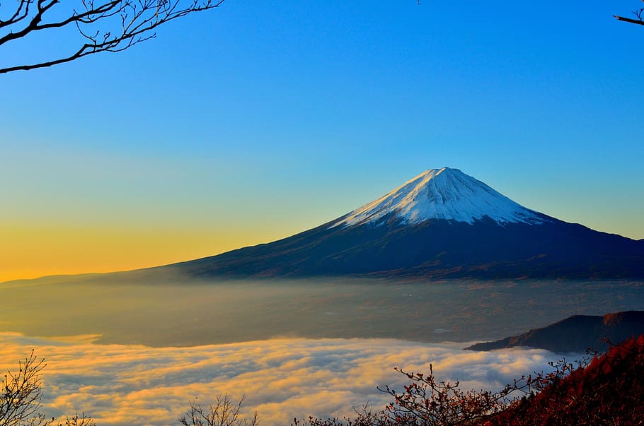 Black and White Mountain over Yellow White and Blue Sky, clouds HD wallpaper