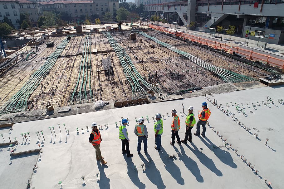 seven construction workers standing on white field, person, human HD wallpaper