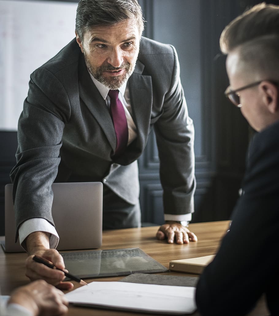 Man Holding Pen Pointing Note in Front of Man in Black Suit, brainstorming, HD wallpaper