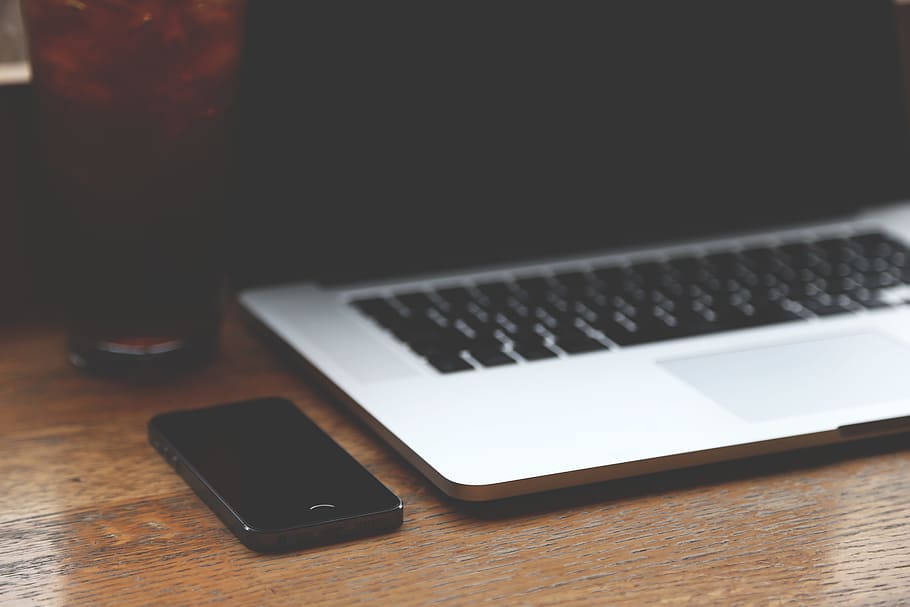 Black Iphone 7 Near Silver Macbook Pro, blur, blurred, computer HD wallpaper