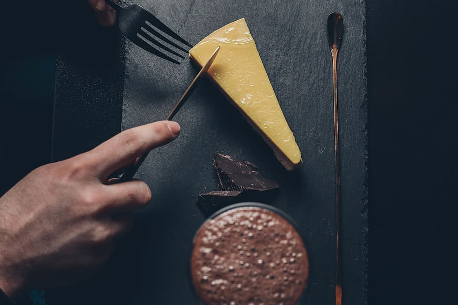person slicing pie, lemoncake, choccolatte, human hand, one person HD wallpaper