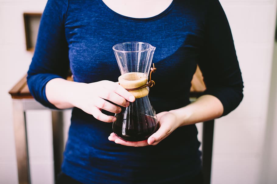person holding clear glass vase, human, people, cup, coffee, chemex