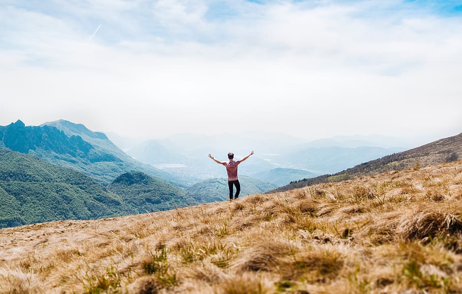 adventure, clouds, grass, grassland, landscape, man, mountain top HD wallpaper