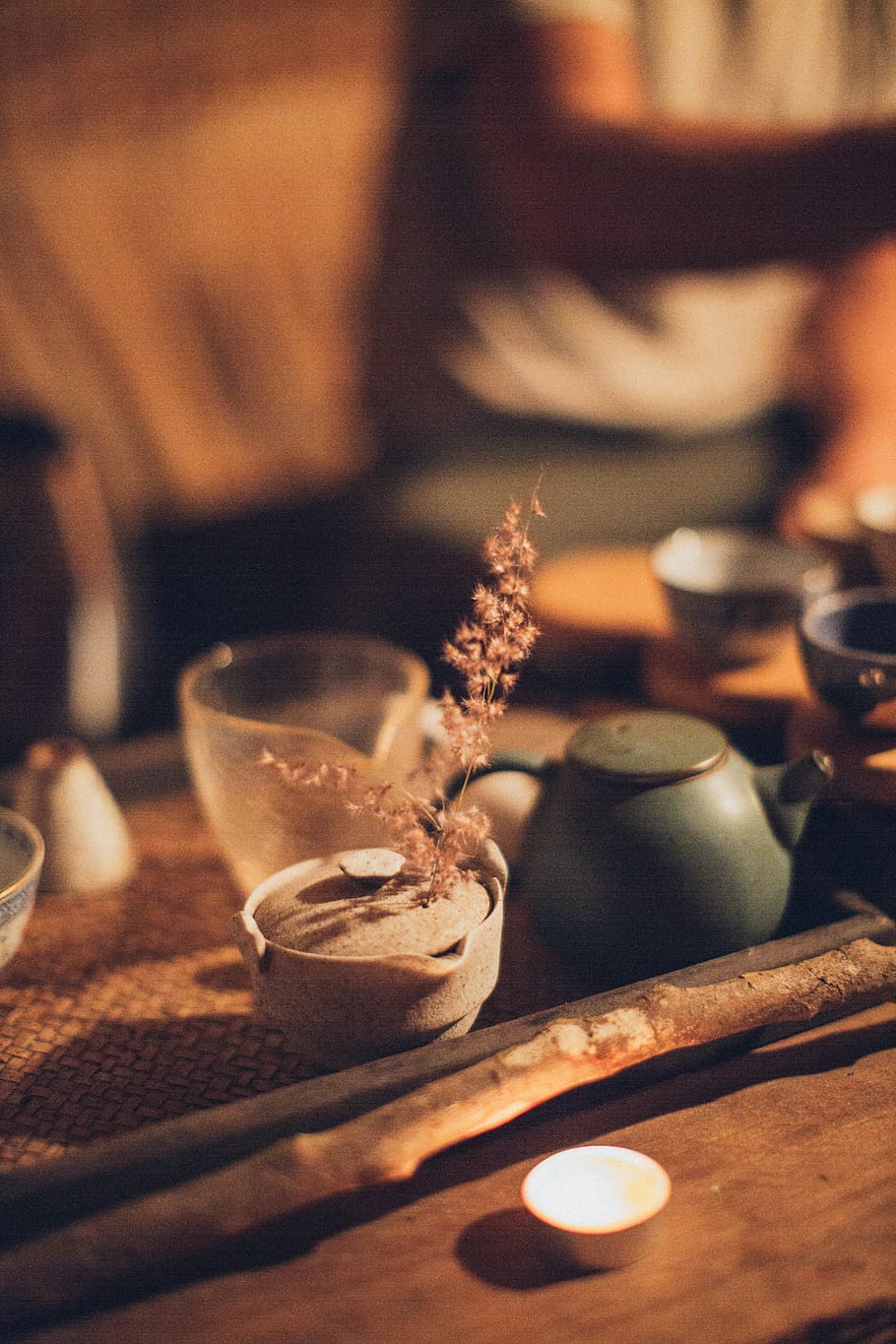 Lighted Tealight Beside Wooden Stick and Ceramic Teapot, beverage HD wallpaper