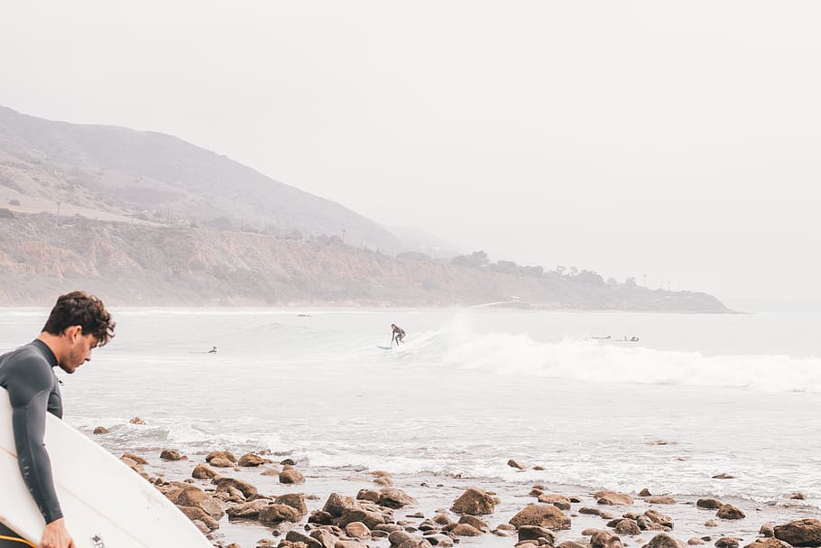 man holding surfboard, person, human, nature, outdoors, water HD wallpaper