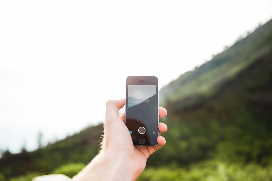 Cellphone photography in the hills, camera, display, meadow, outdoors HD wallpaper