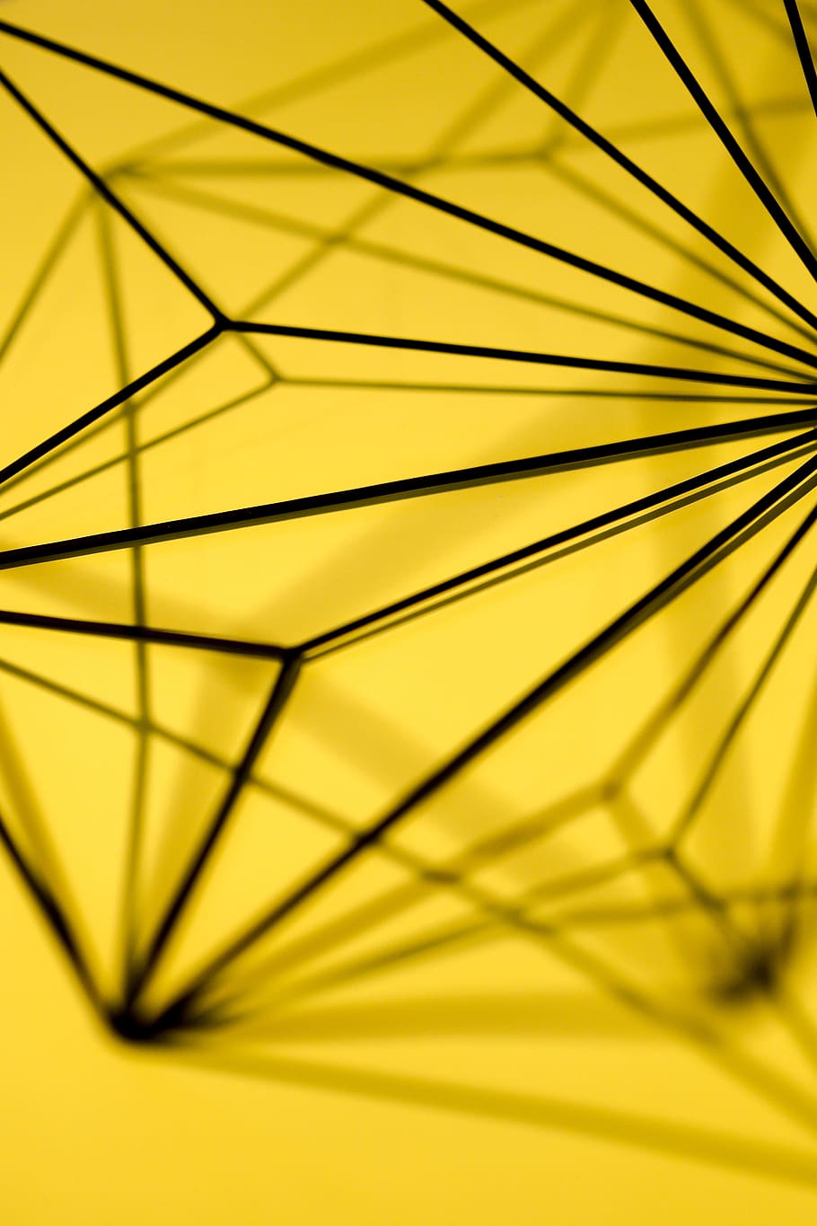 Geometric decoration on yellow background, texture, close-up HD wallpaper