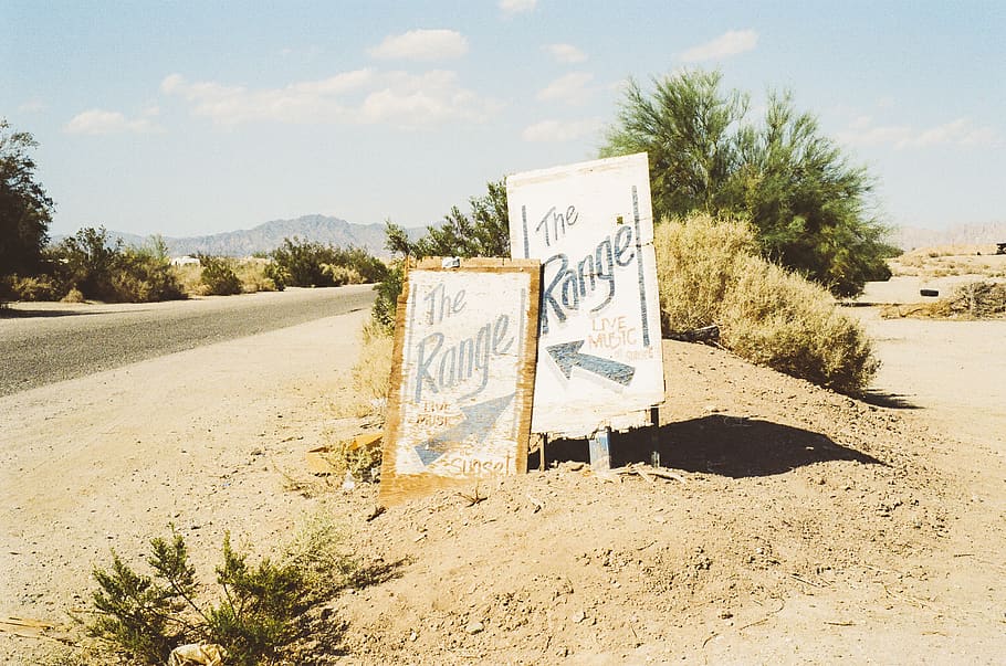 Two White the Range Signage Near Road, text, communication, no people HD wallpaper