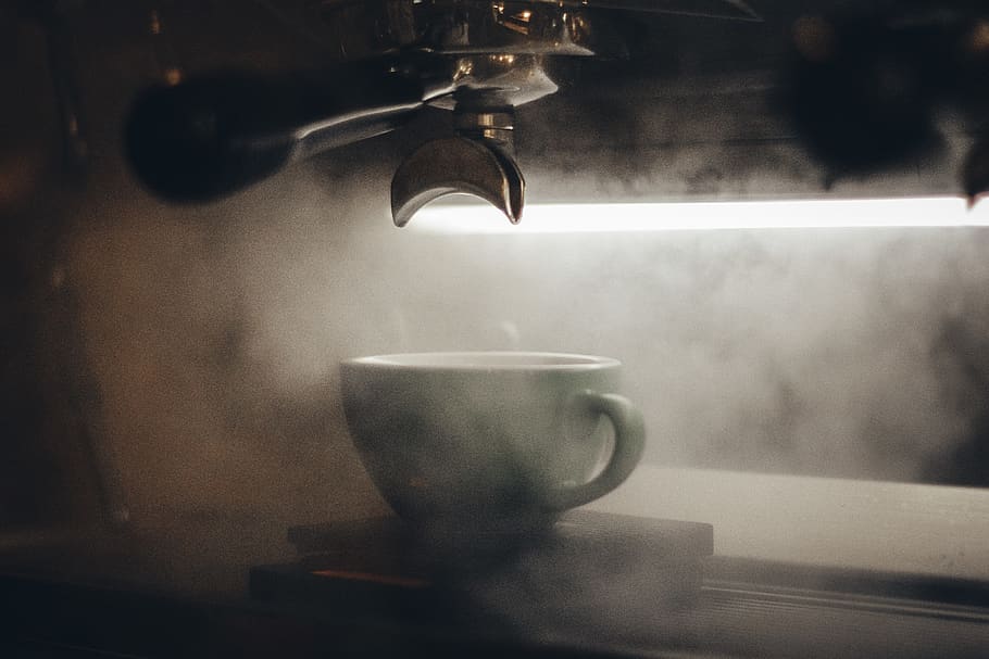 Espresso Machine Pouring Coffee Cups Blurred Background Closeup