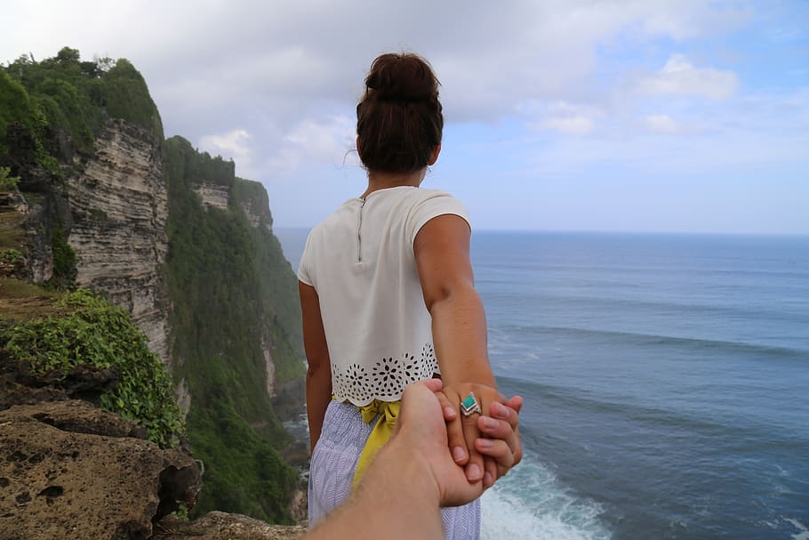 beach, cliff, coast, couple, hands, nature, ocean, outdoors HD wallpaper