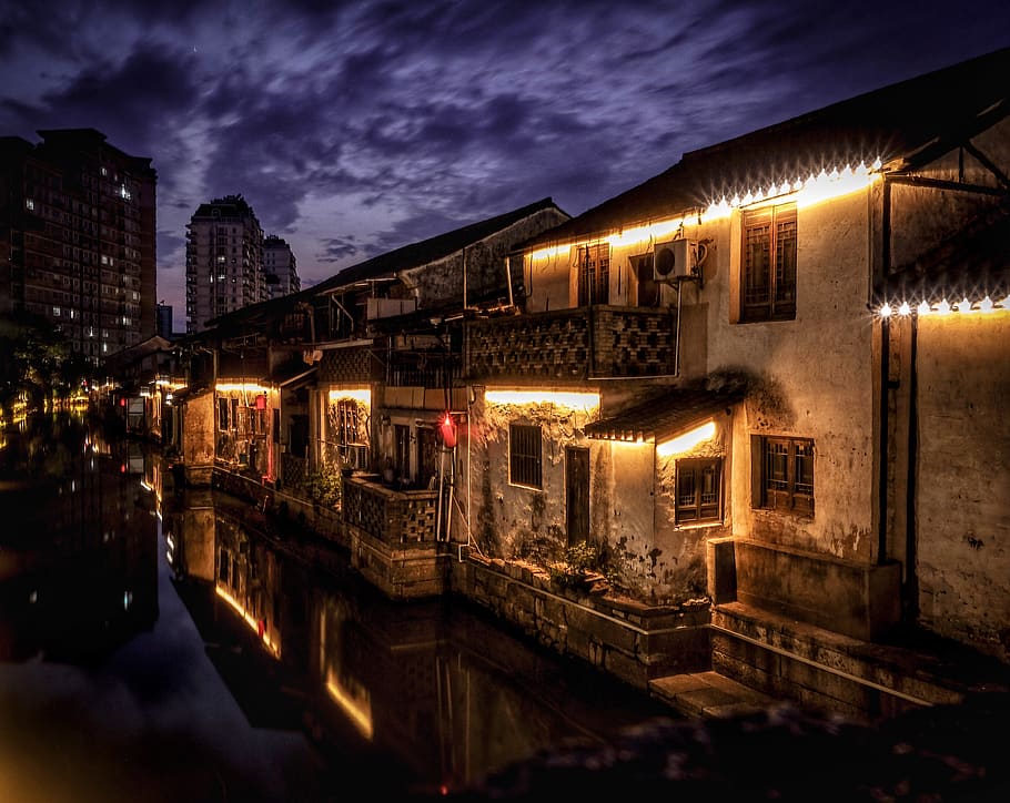 lighted gray concrete building, city, sky, reflection, canal HD wallpaper